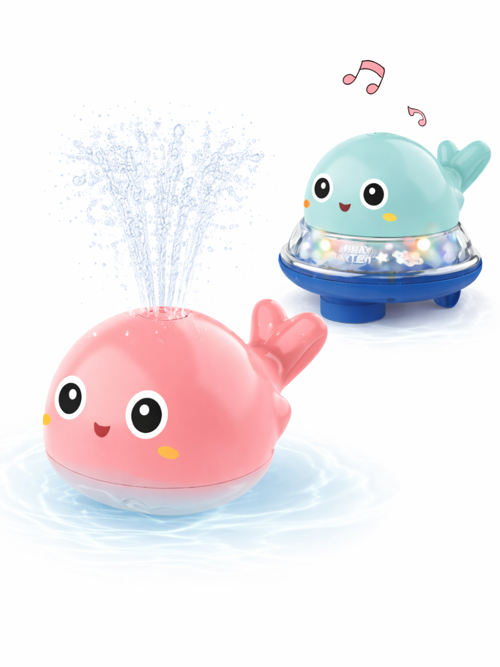 白背景のスタジオ撮影。ピンクのクジラ型バストイが水を噴き上げており、奥に水色のクジラ型バストイ（透明リング内にライト風パーツ付き）が並んでいる。
