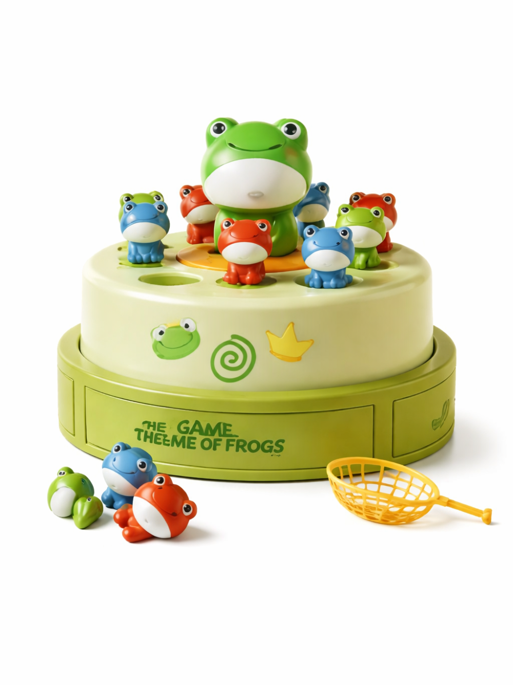 白背景のスタジオで撮影された、カエルモチーフのキャッチゲーム玩具。中央に大きなカエル、周囲にカラフルな小さなカエル人形が並び、黄色いネットと予備パーツが付属している。
