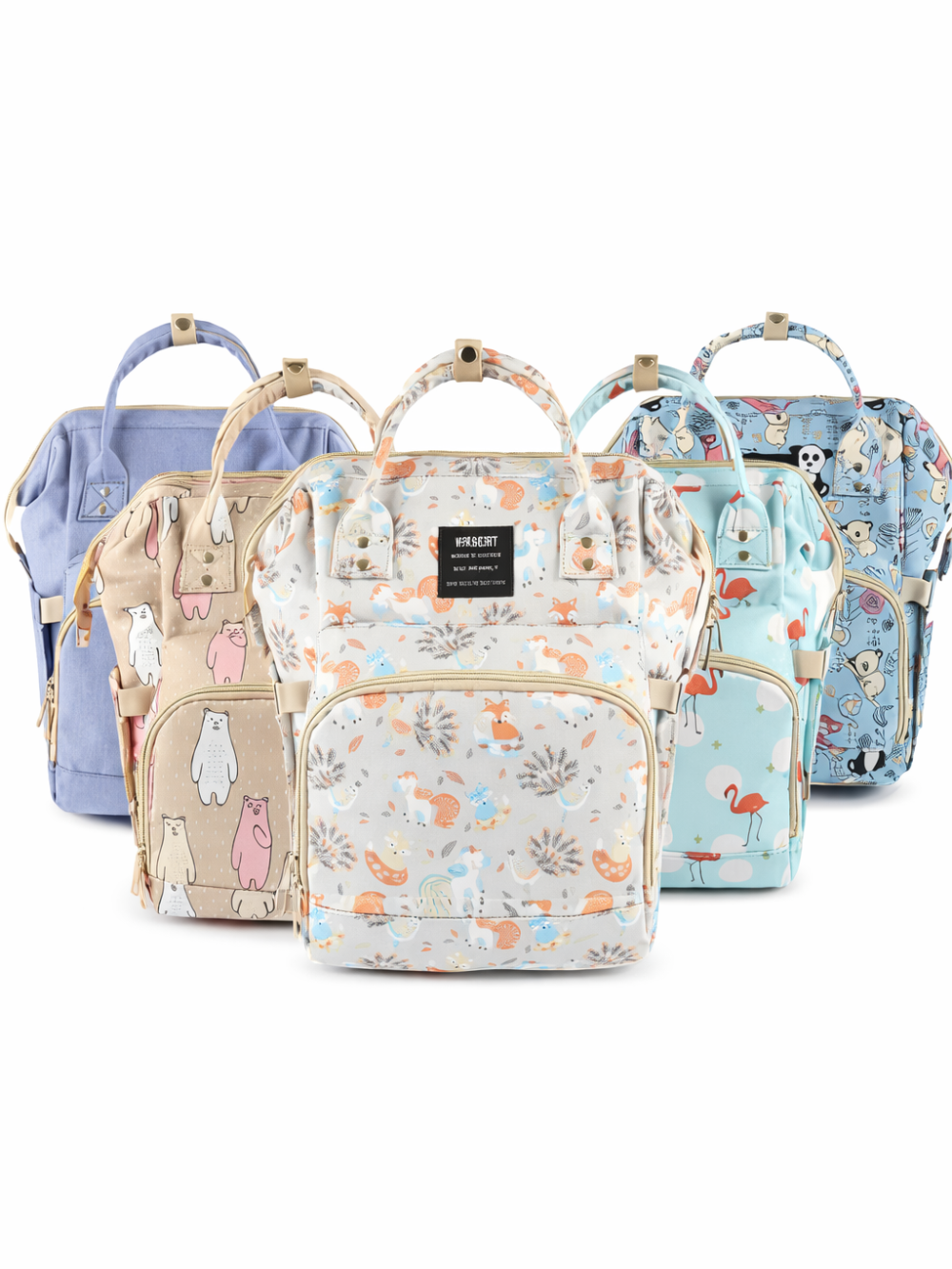 白背景のスタジオで撮影された、柄違いのマザーズリュック4点の集合画像。フロントにファスナーポケットとベージュの持ち手があり、ブルー無地／くま柄／ボタニカル柄／フラミンゴ柄／キャラクター柄が並んでいる。
