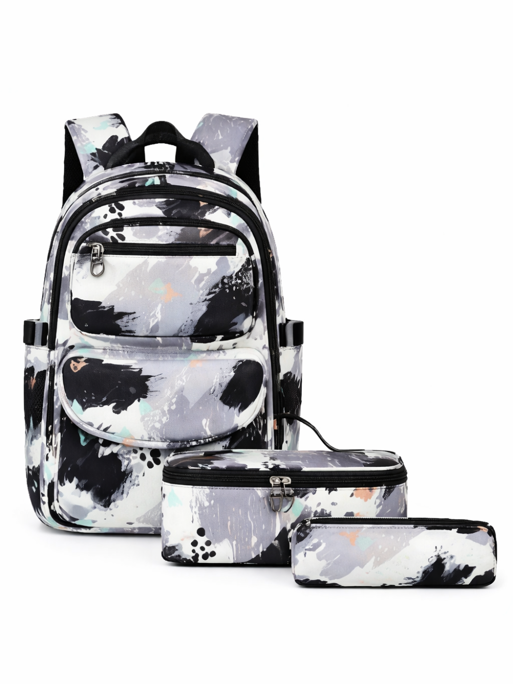 黒・白・グレーのスプラッターペイント柄の3点セット（バックパック、ランチバッグ、ペンケース）が、白背景で並んだ商品写真。