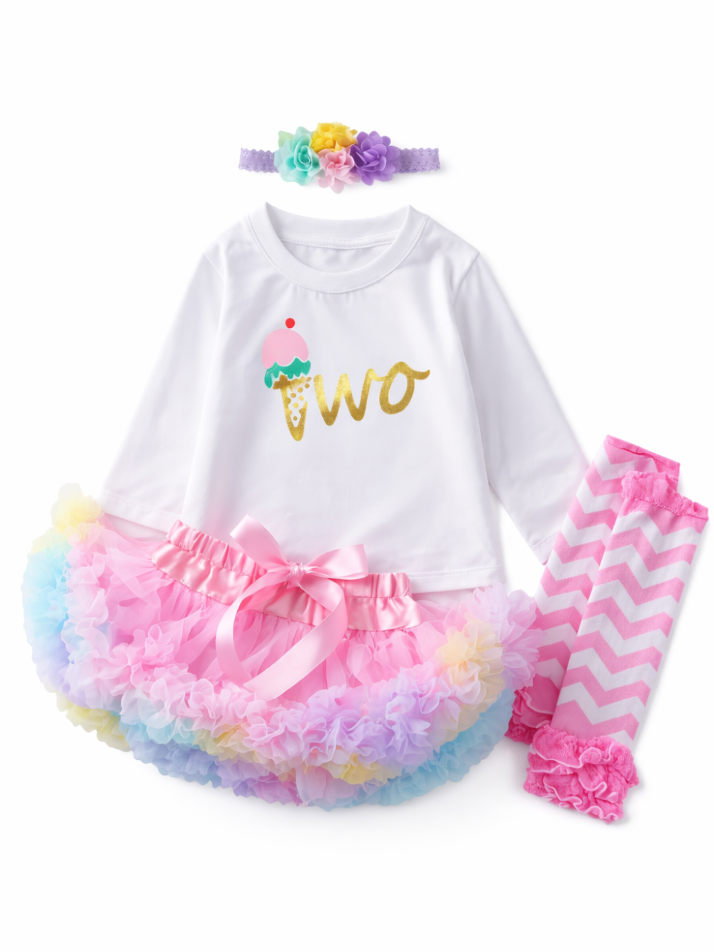 白い長袖トップス（アイスクリーム柄「two」ロゴ）、カラフルなチュチュスカート、ピンクのジグザグ柄レギンス、花付きヘアバンドのベビー女の子用4点セット（スタジオ白背景）

