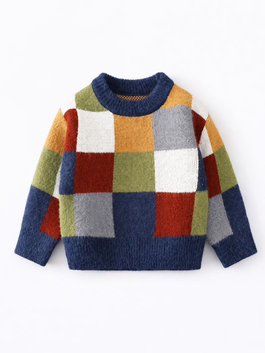 白背景の正面写真。子ども用ニットセーター（長袖）。ネイビーの襟・袖口・裾に、オレンジ／グリーン／レッド／ホワイト／グレーのブロックチェック（パッチワーク風）柄。
