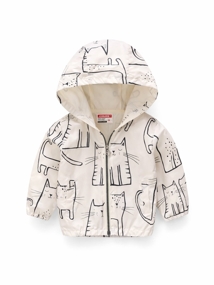 子ども用フード付きジップジャケット（オフホワイト）。黒の手描き風ネコ柄プリント、フロントファスナー、フード付き。袖口と裾はゴム仕様で、軽いアウターとして着やすいデザイン。
