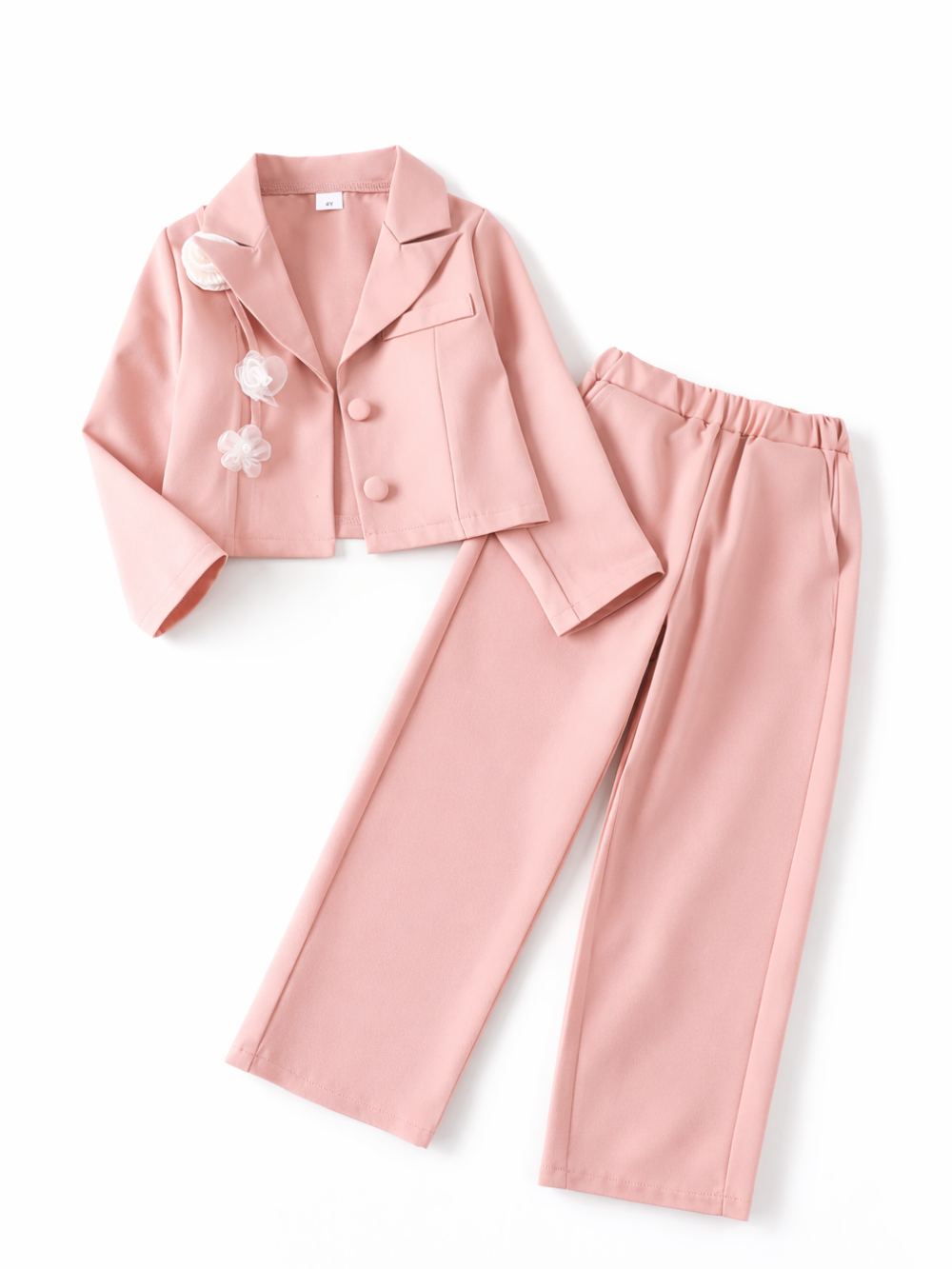 ピンクのショート丈ジャケットとワイドパンツのキッズツーピースセット、立体フラワー飾り付き、白背景の商品画像