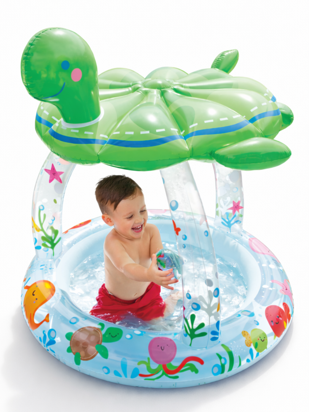 カメ型サンシェード付きのベビー用インフレータブルプールの商品画像。透明支柱と海の生き物柄の円形プールに、グリーンのカメ屋根が付いたPVC製のキッズ水遊びプール。
