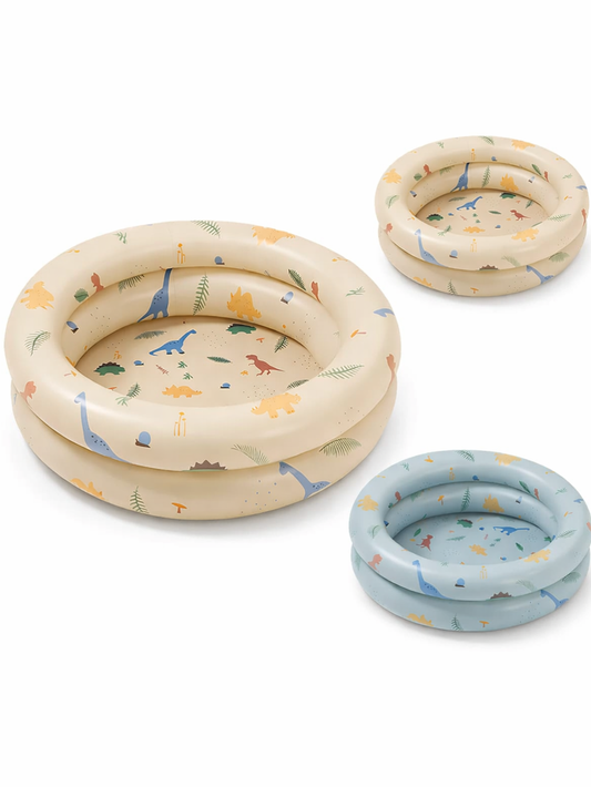 恐竜柄の丸型ベビー用インフレータブルプール（ベージュ／ライトブルー）。2段リング構造で、水遊びや室内ボールプールに使える。
