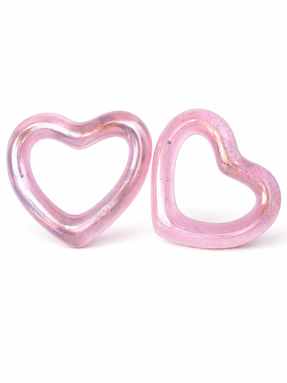 ピンクのハート型浮き輪2個セット。透明感のある素材にラメが入ったデザインで、白背景に並べた商品画像。