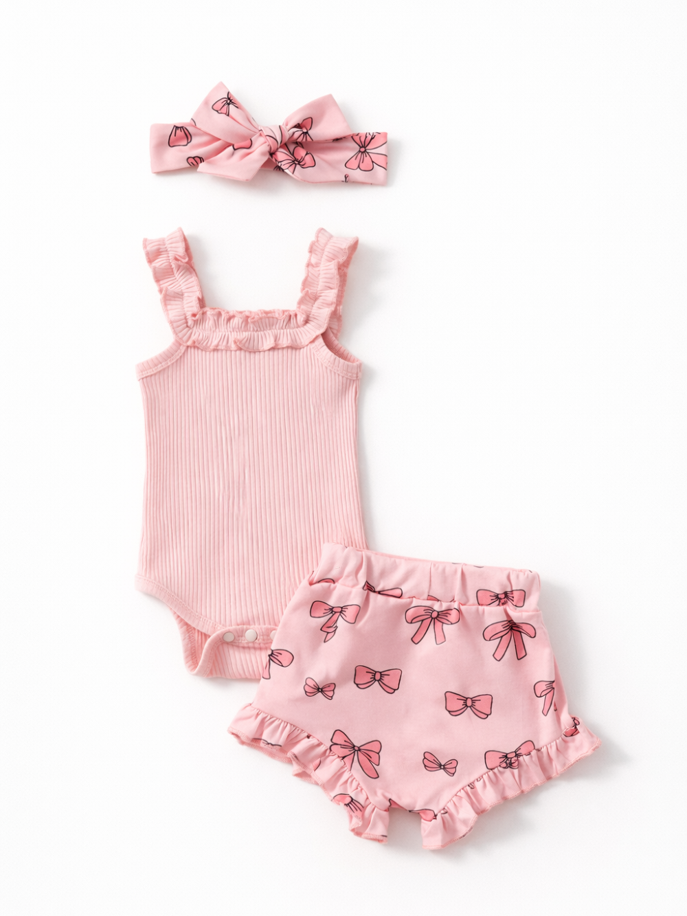 ピンクのフリルロンパースとリボン柄ショートパンツとヘアバンドのセット 全体
