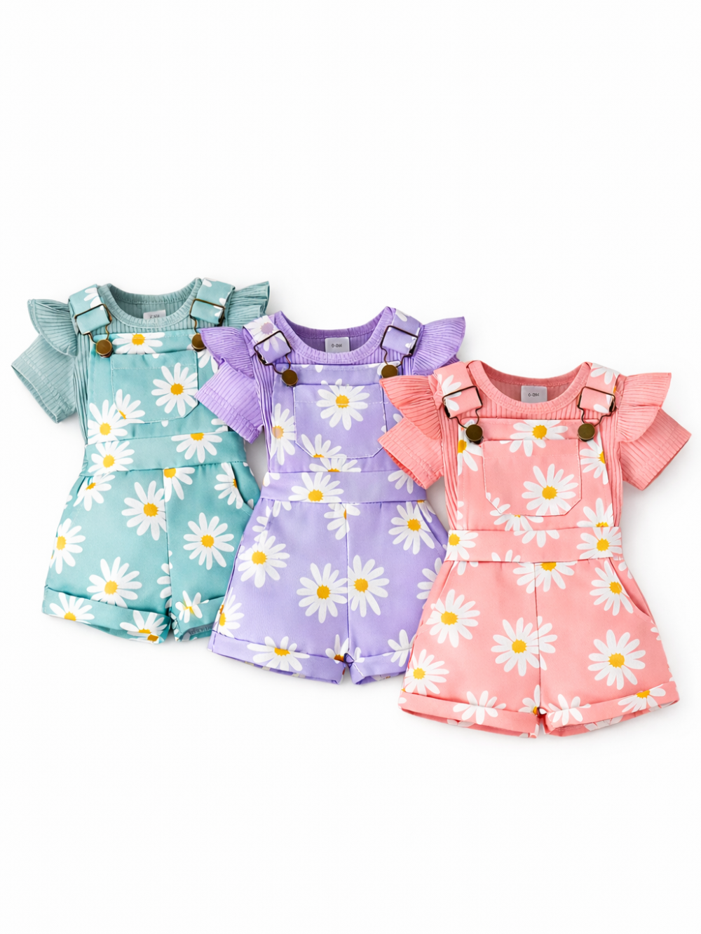 3色（グリーン・パープル・ピンク）のデイジー柄サロペットショーツセットを並べた全体イメージ
