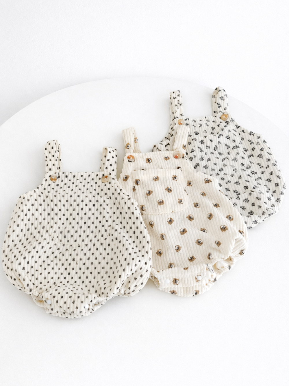 子どもボディスーツ 3柄バリエーション（チェック柄・くま柄・花柄）集合カット
