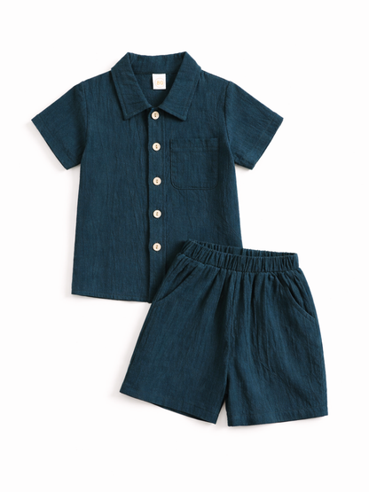 子ども半袖ポロシャツセットアップ ダークグリーン トップスとショートパンツの全体
