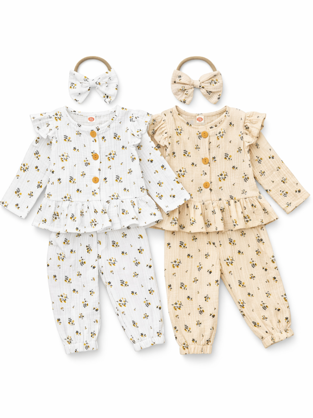 白背景に、小花柄のベビー／キッズ上下セット2色（ホワイト／ベージュ）と、各色に合わせたリボンヘアバンド2点を並べた商品画像。
