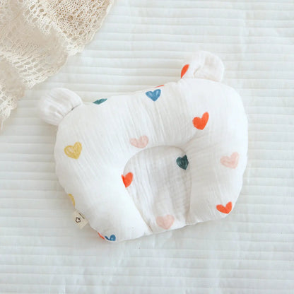 赤ちゃんが安心して眠るシーン ベビーピロー使用例
