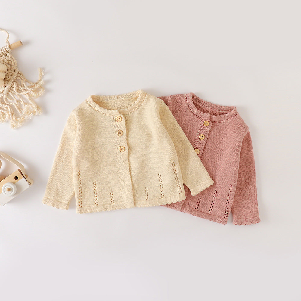 ピンクとアプリコットのベビーガール用コットンニットカーディガンを並べた写真

