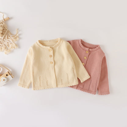 ピンクとアプリコットのベビーガール用コットンニットカーディガンを並べた写真
