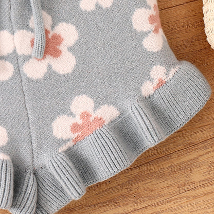 花柄ニット生地の編み目と袖口リブがわかるディテール
