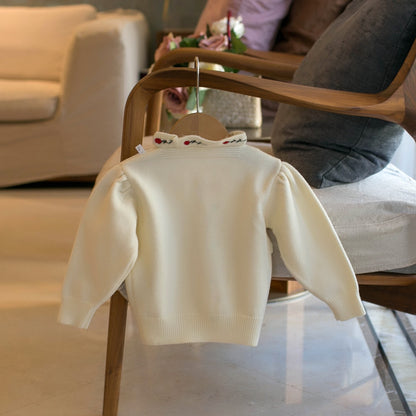 ピンクカラーのローズ刺繍ベビーセーター
