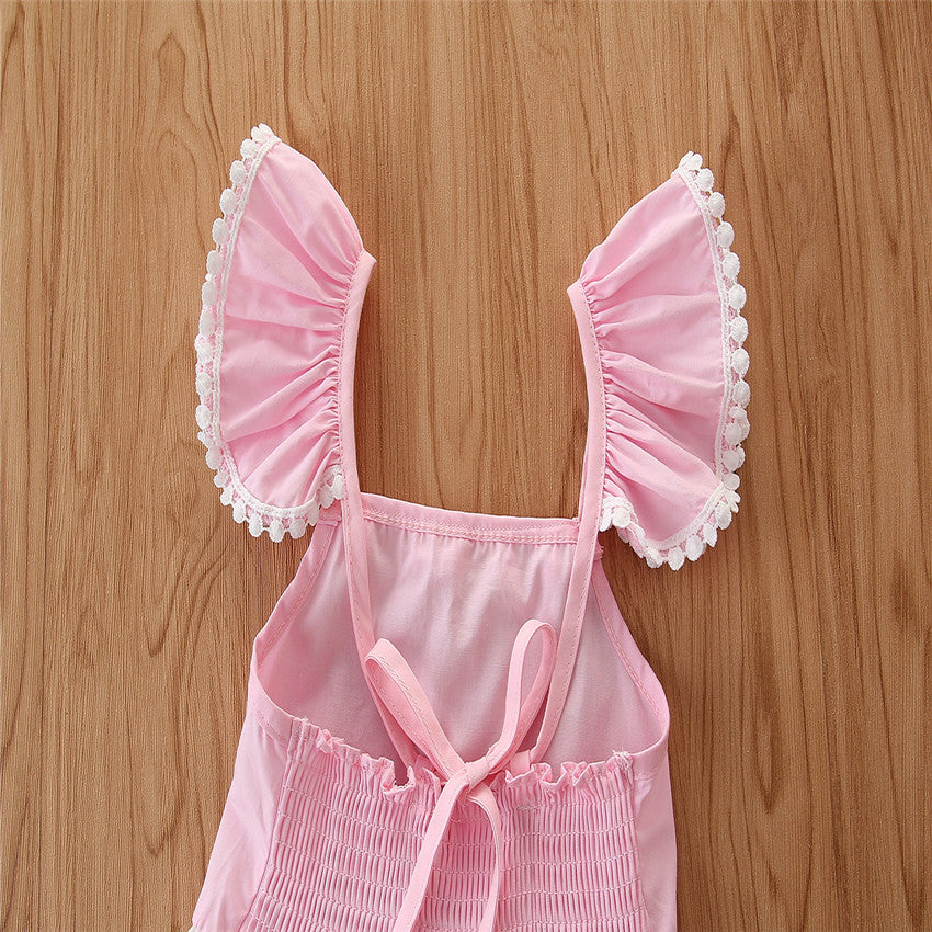 軽やかに揺れるレースタッセル裾で夏のおしゃれが決まる 女の子イレギュラーヘムワンピース フリル袖 コットン 110~160cm