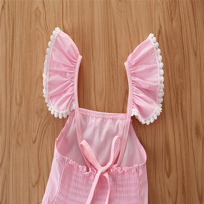 軽やかに揺れるレースタッセル裾で夏のおしゃれが決まる 女の子イレギュラーヘムワンピース フリル袖 コットン 110~160cm