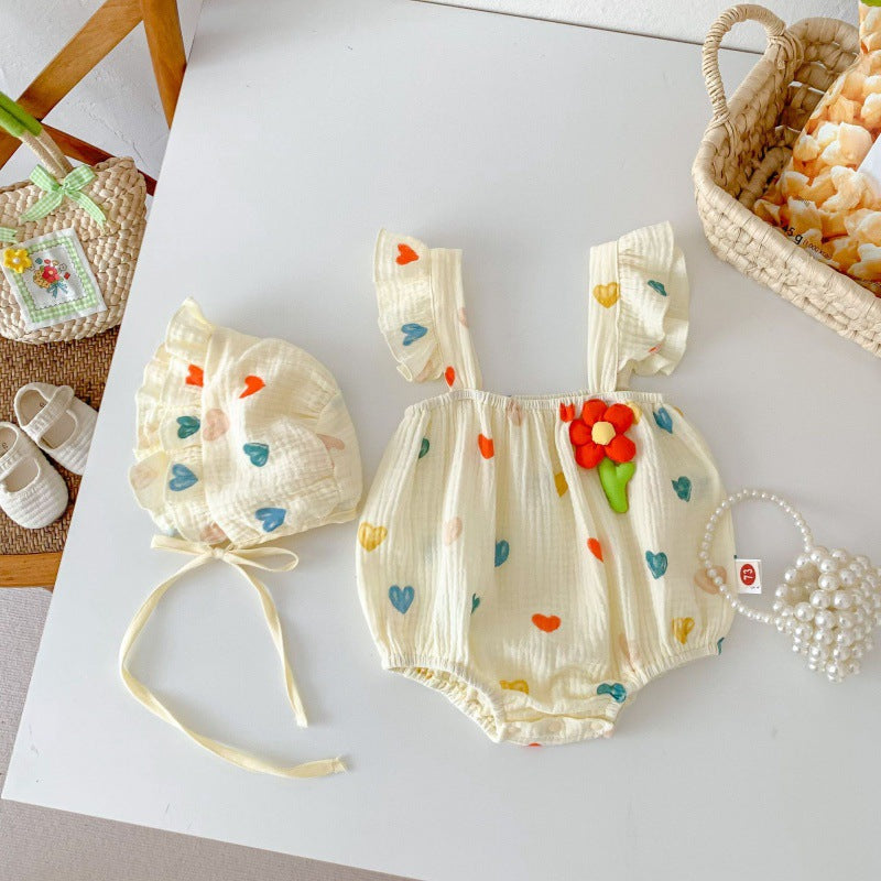 帽子とストラップが分かるハート柄スリングロンパース全体
