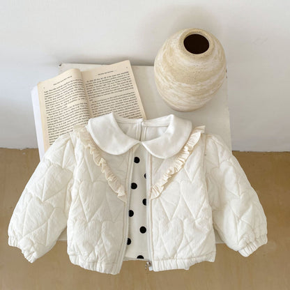 内側のコットンライク裏地が見えるベビーコートの内側写真
