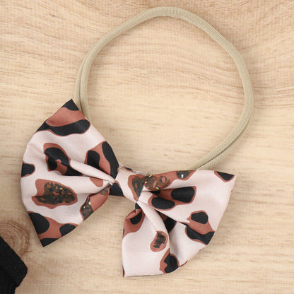 涼しげにおしゃれが完成する 女の子ホルターネックノースリーブ上下セット レオパード柄フリルスカート＋リボンヘアバンド付き コットン95% 70~100cm