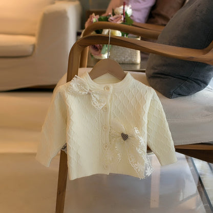 かわいいリボンデザインの女の子用カーディガン
