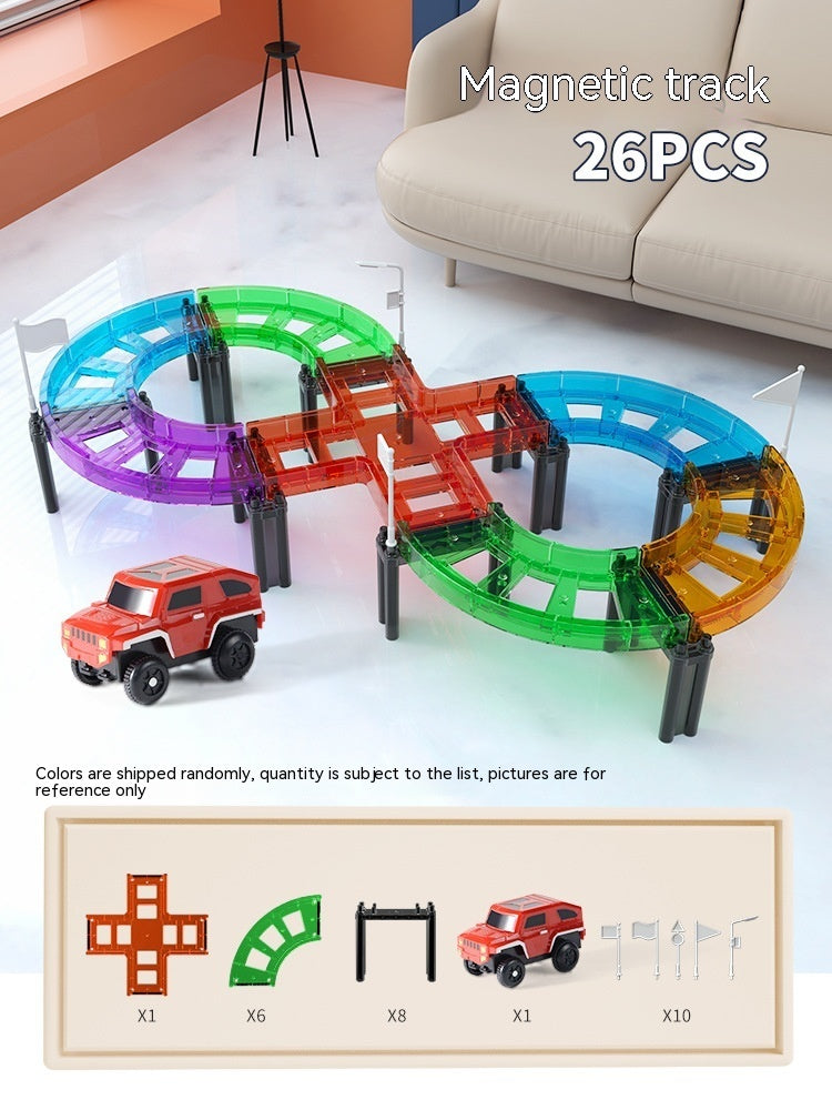 26ピースのカラフルウィンドウマグネットブロックで組み立てたミニトラックコースと遊ぶ子ども
