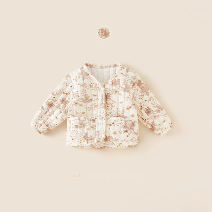 コットン裏地と中綿入りのふんわりした厚みが分かる子どもコートの内側ディテール画像
