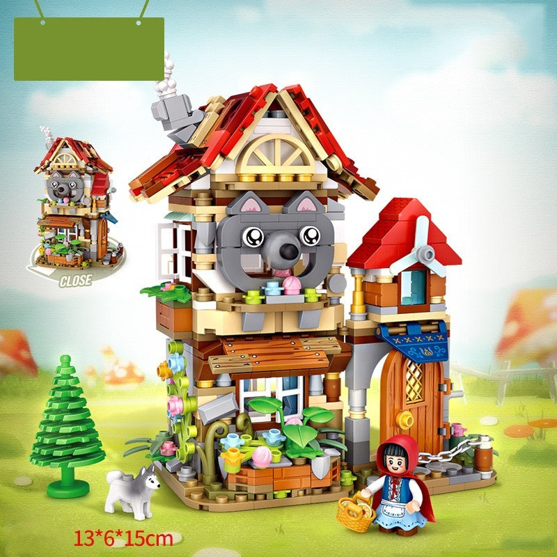 童話「赤ずきん」をモチーフにしたミニブロックセット。大きなオオカミ顔の木造ハウス、赤い三角屋根、2階建てバルコニー、森の背景、松の木、白いヤギ、花と野菜の小物、赤ずきんフィギュア、カラフルなアクセサリー多数。精巧なディテールで想像力・集中力・空間認識力を育てる知育ビルディングトイ。サイズ13×6×15cm。
