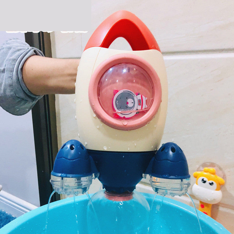 恐竜回転スプリンクラーバストイの使用イメージ 洗面台で水遊び
