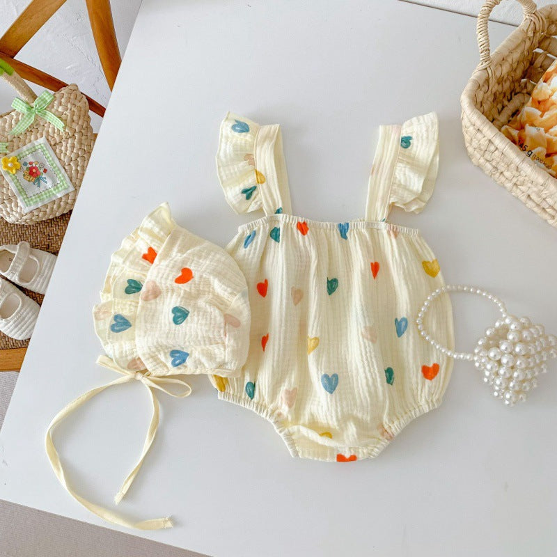 結び紐付きのハート柄ベビー帽子単体イメージ
